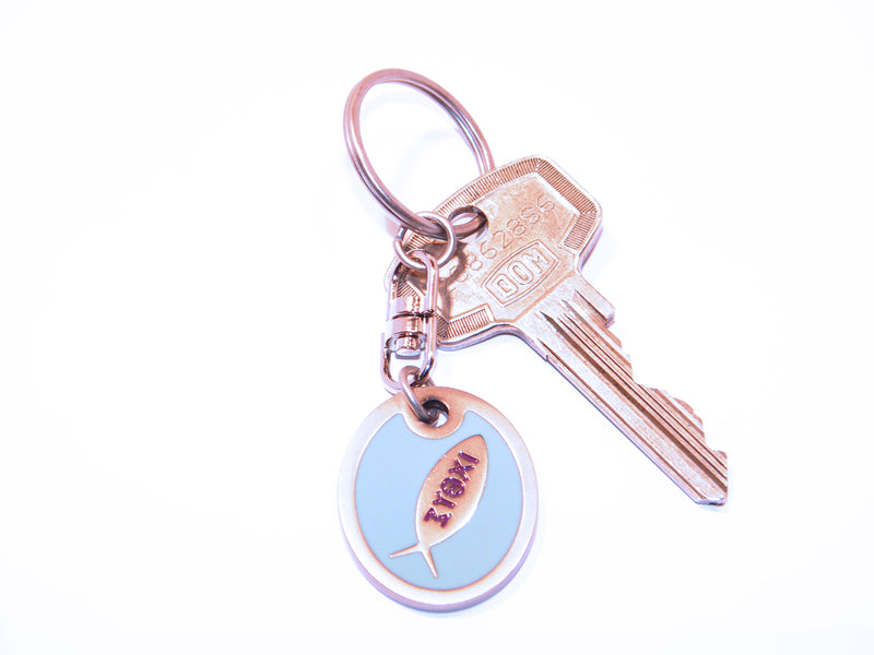 Oval keyring with fish symbol
